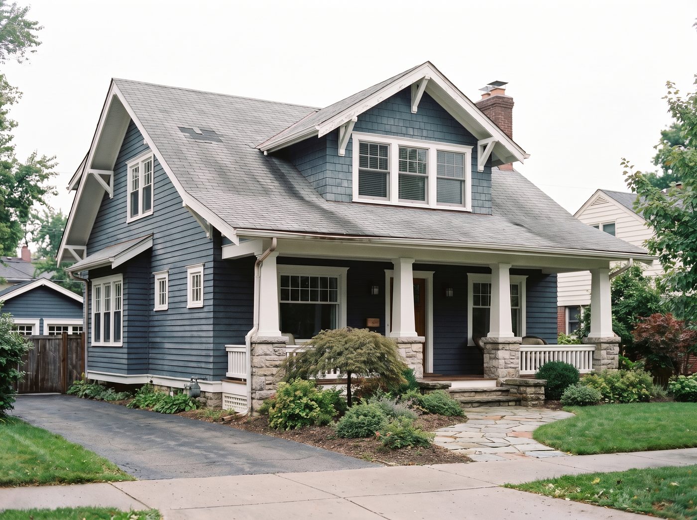 Full exterior transformation, before (storm-damaged)